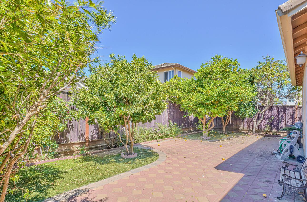 1013 Capri Way Salinas, CA 93905 - Photo 12 of 23 a front view of a house with a yard
