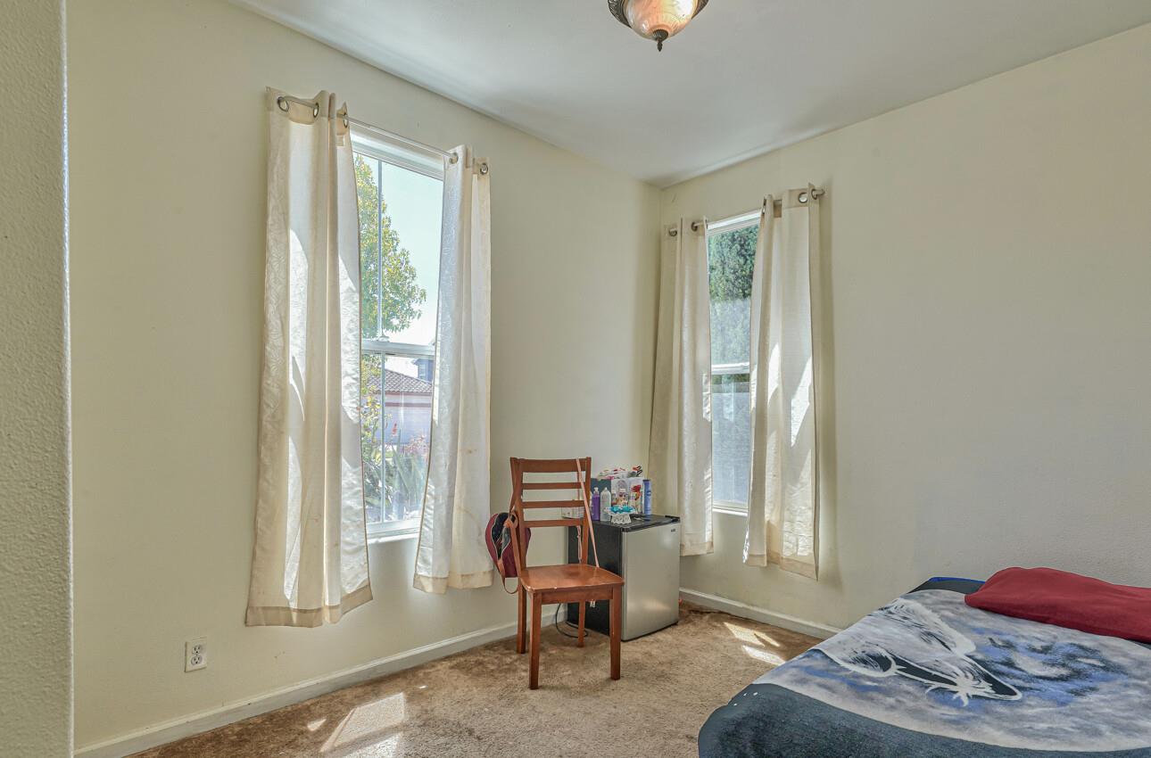 1013 Capri Way Salinas, CA 93905 - Photo 19 of 23 a living room with furniture and two window