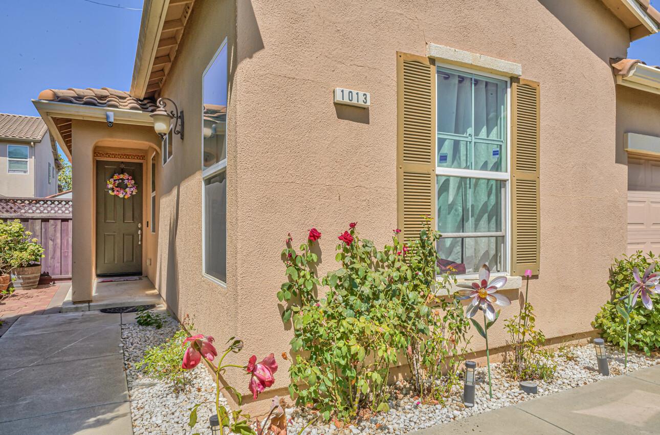 1013 Capri Way Salinas, CA 93905 - Photo 3 of 23 a front view of a house with an outdoor space