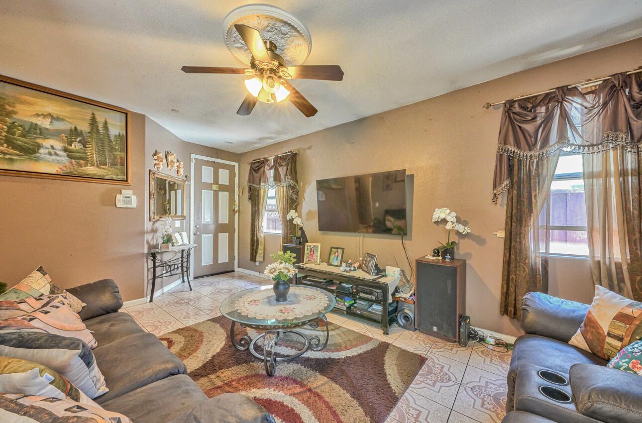 1013 Capri Way Salinas, CA 93905 - Photo 6 of 23 a living room with furniture and a large window