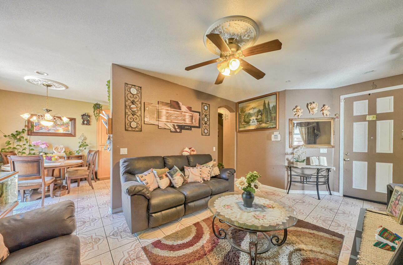 1013 Capri Way Salinas, CA 93905 - Photo 7 of 23 a living room with furniture and a large window