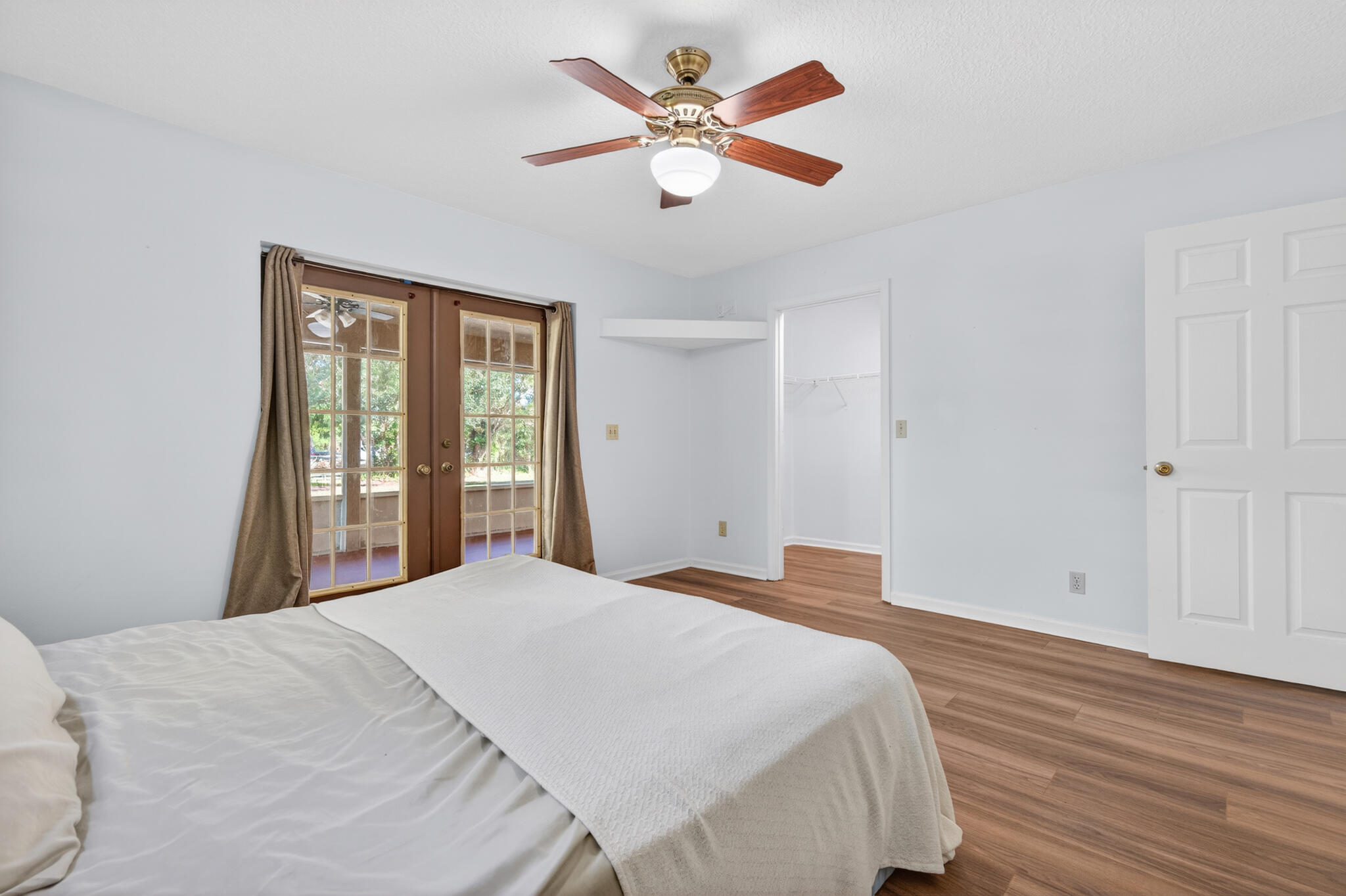 17889 62nd Road North The Acreage, FL 33470 - Photo 14 of 32 a bedroom with a bed and window