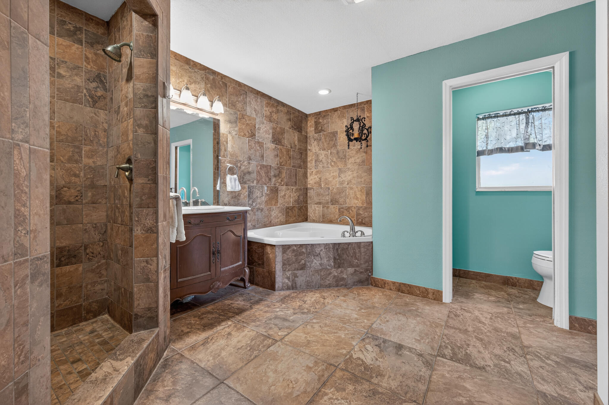 17889 62nd Road North The Acreage, FL 33470 - Photo 20 of 32 a bathroom with a tub shower sink and mirror