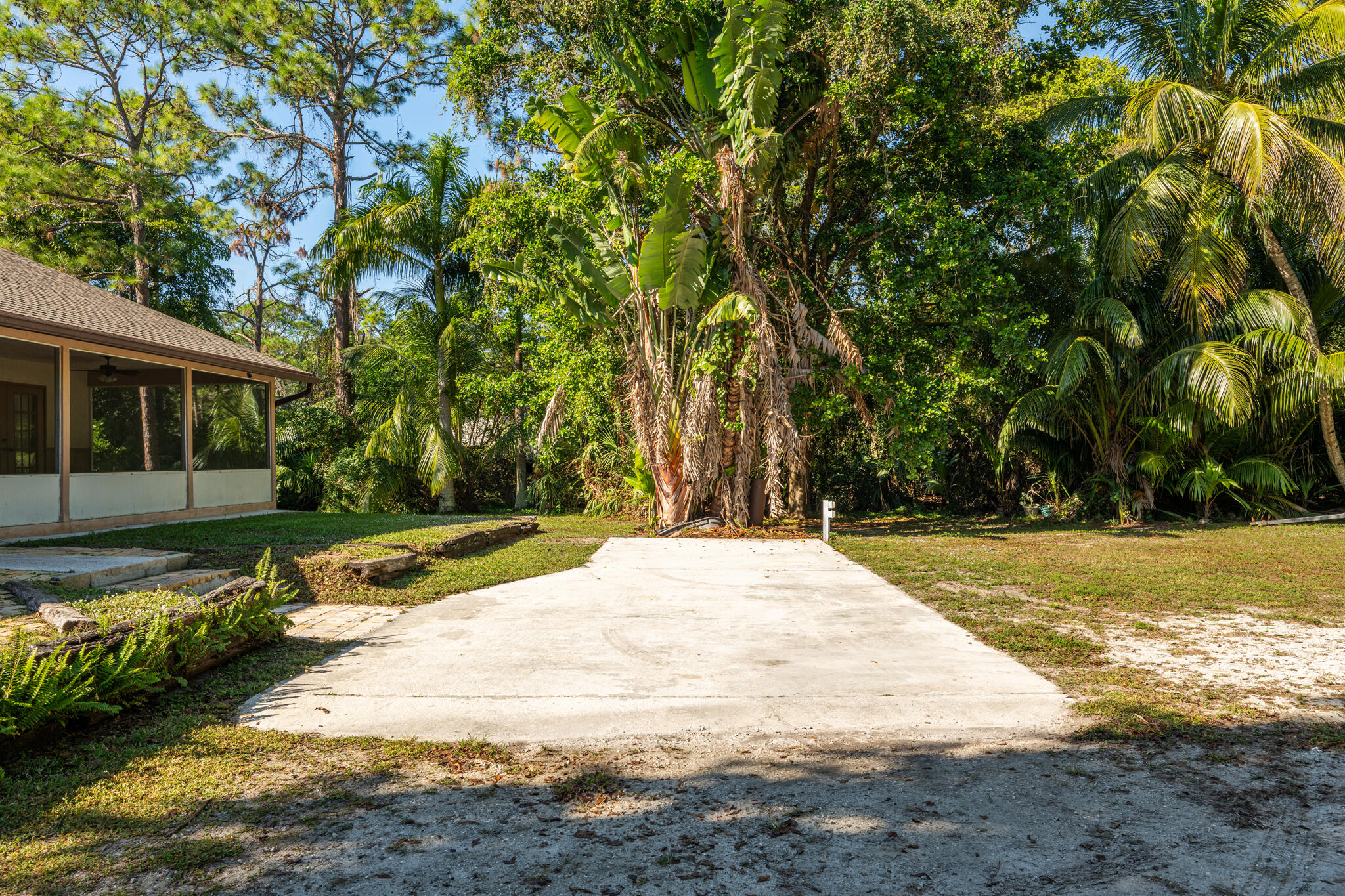 17889 62nd Road North The Acreage, FL 33470 - Photo 26 of 32 a view of a backyard with a garden