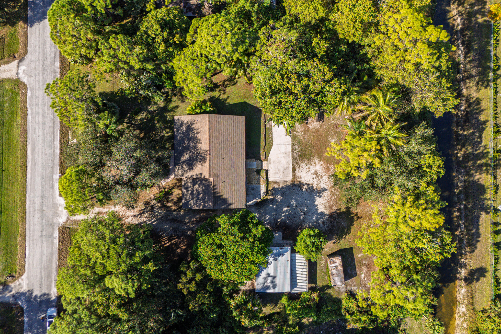 17889 62nd Road North The Acreage, FL 33470 - Photo 28 of 32 front view of a house with a tree