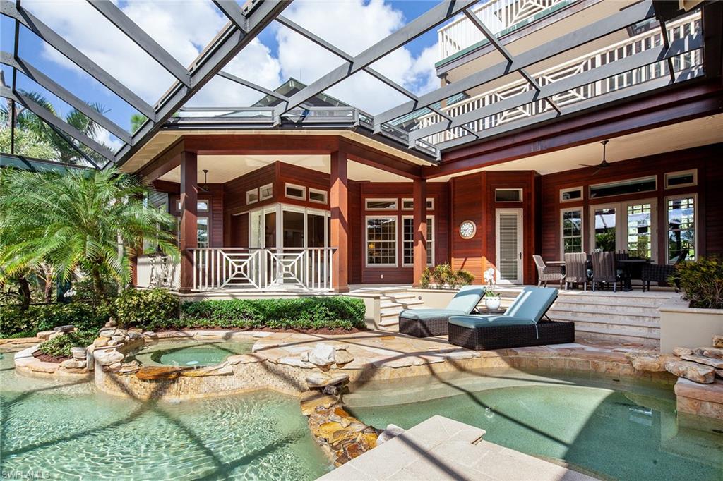 1205 Pocantico Lane Naples, FL 34110 - Photo 23 of 35 a view of a patio with furniture and a porch