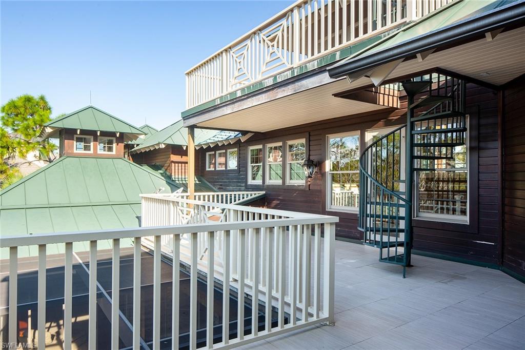 1205 Pocantico Lane Naples, FL 34110 - Photo 25 of 35 a view of a house with a deck