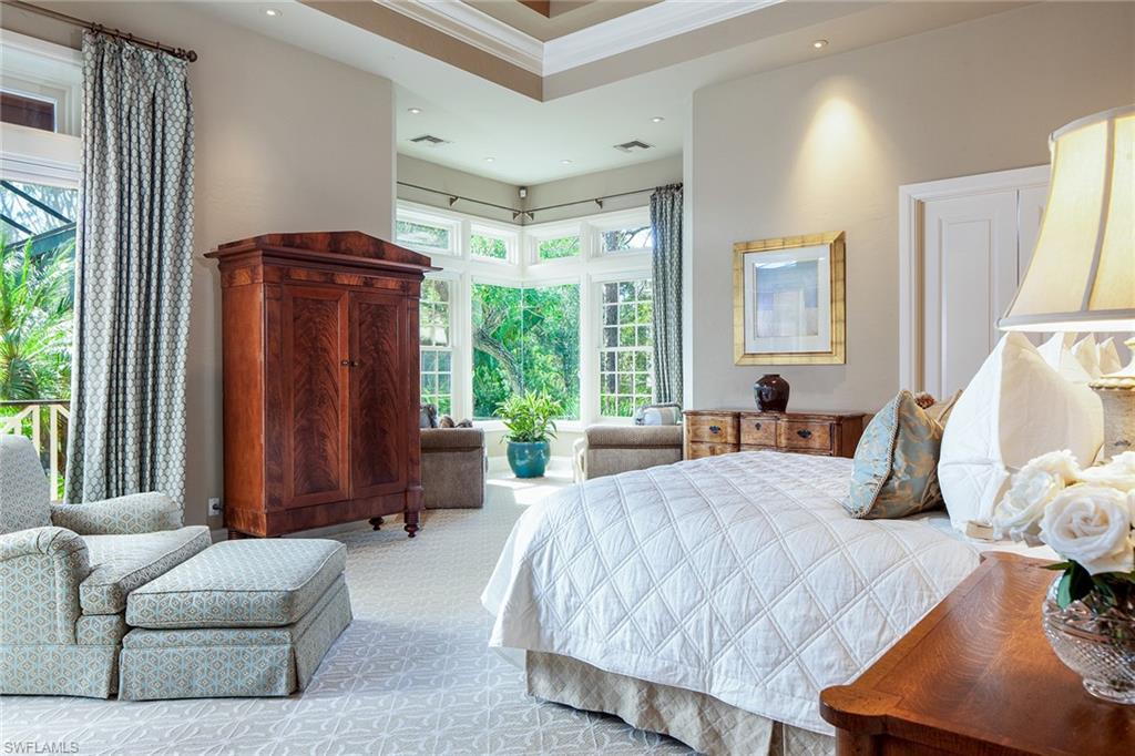 1205 Pocantico Lane Naples, FL 34110 - Photo 26 of 35 a bedroom with furniture and windows