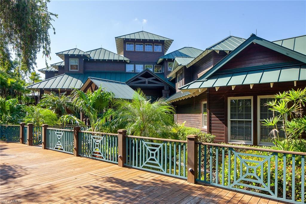 1205 Pocantico Lane Naples, FL 34110 - Photo 3 of 35 a view of a house with wooden deck