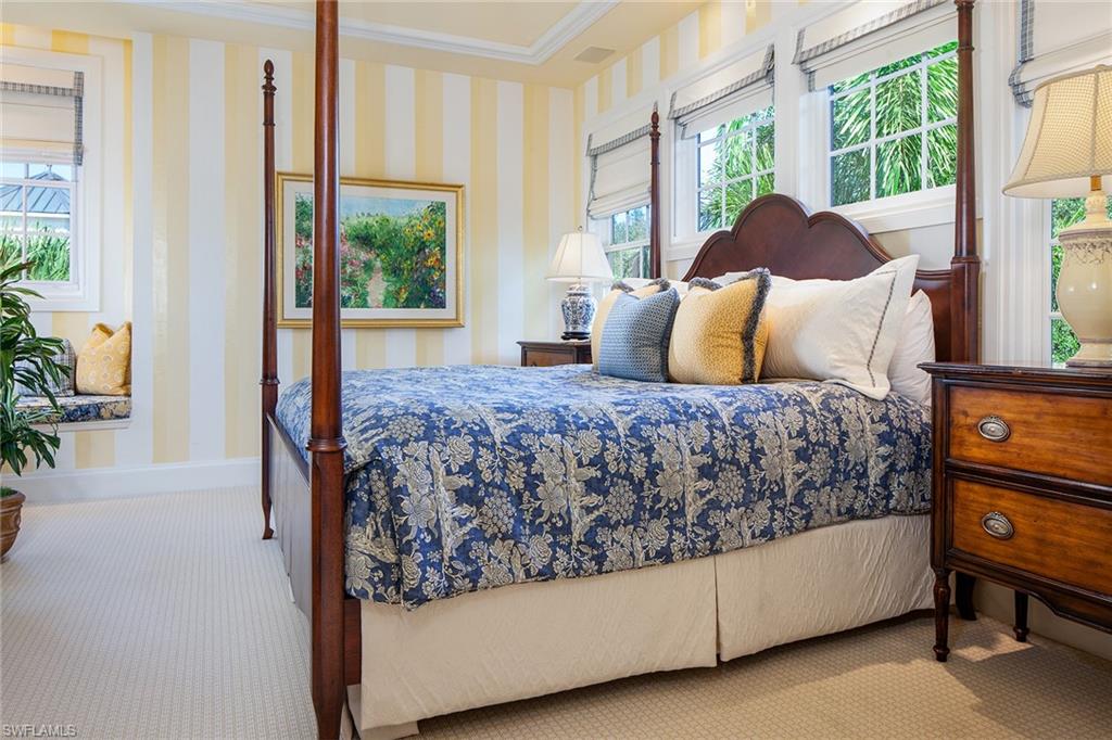 1205 Pocantico Lane Naples, FL 34110 - Photo 32 of 35 a bed sitting in a bedroom next to a window