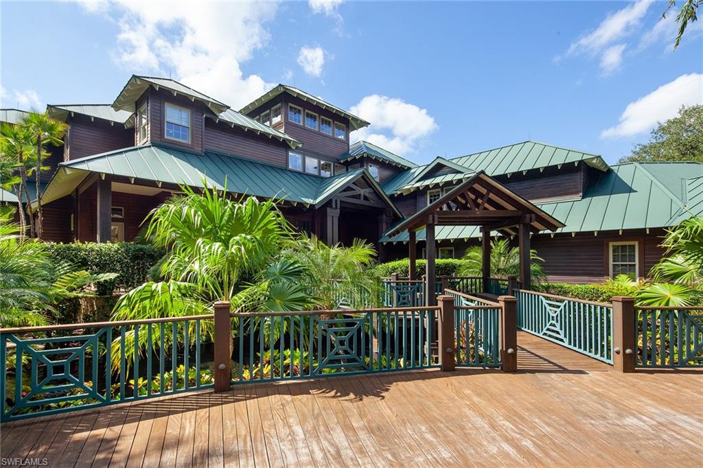 1205 Pocantico Lane Naples, FL 34110 - Photo 5 of 35 a view of a house with wooden deck