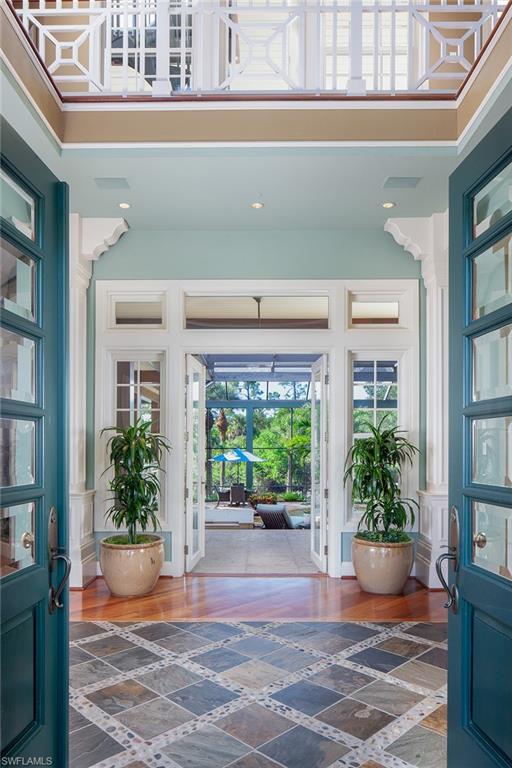 1205 Pocantico Lane Naples, FL 34110 - Photo 7 of 35 a view of a house with potted plants