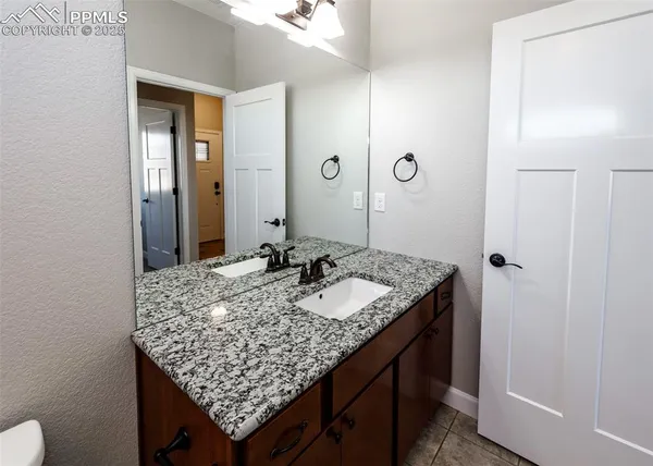 a bathroom with a toilet and a bathtub