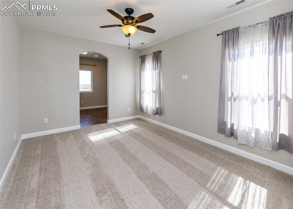 2105 Slocum Road Peyton, CO 80831 - Photo 16 of 27 a view of an empty room with a window