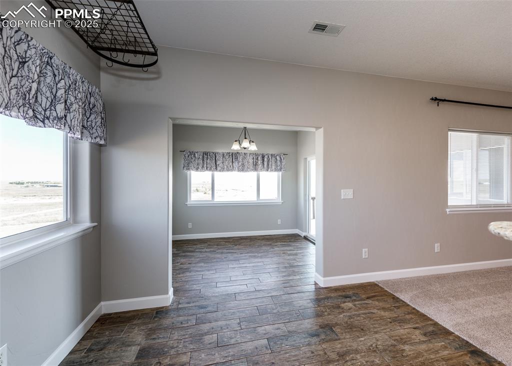 2105 Slocum Road Peyton, CO 80831 - Photo 10 of 27 an empty room with windows