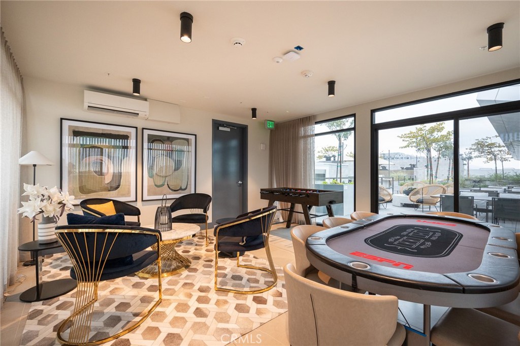 709 East Walnut, Unit 219 Pasadena, CA 91109 - Photo 32 of 38 a living room with furniture and a large window