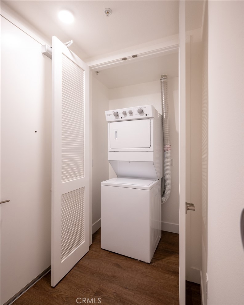 709 East Walnut, Unit 219 Pasadena, CA 91109 - Photo 6 of 38 a utility room with closet dryer and washer