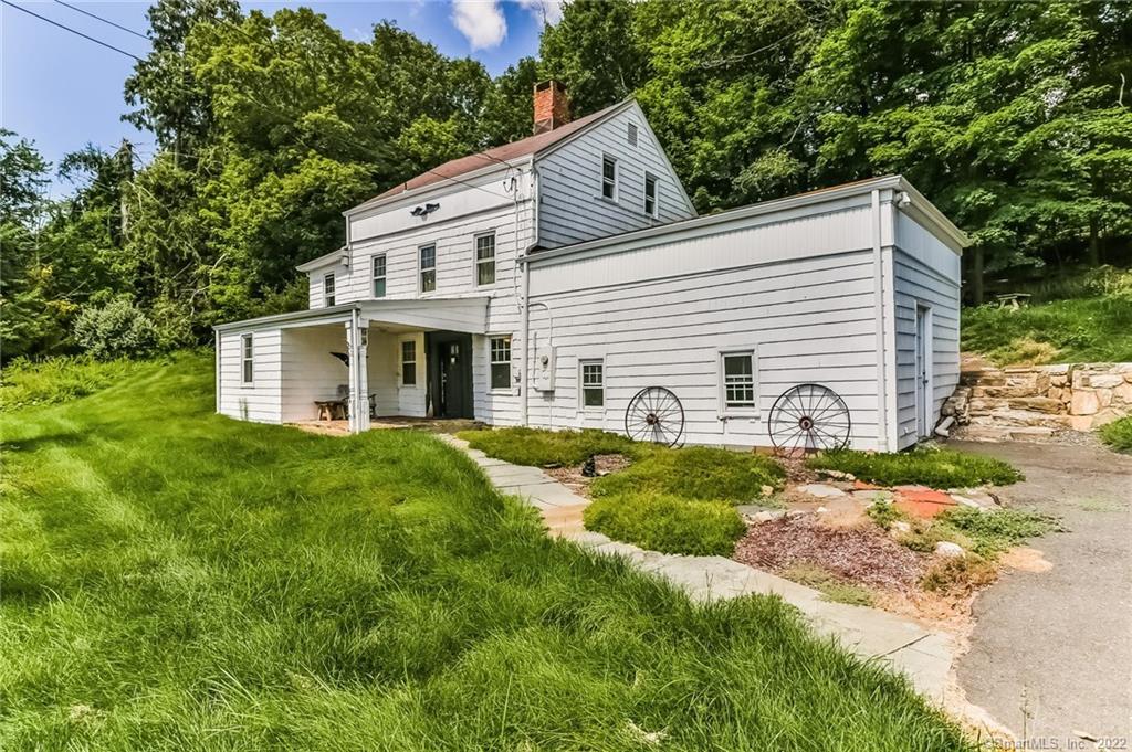 65 Ball Pond Road Danbury, CT 06811 - Photo 1 of 1 a view of a house with a yard