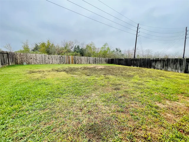 a view of a water with a big yard