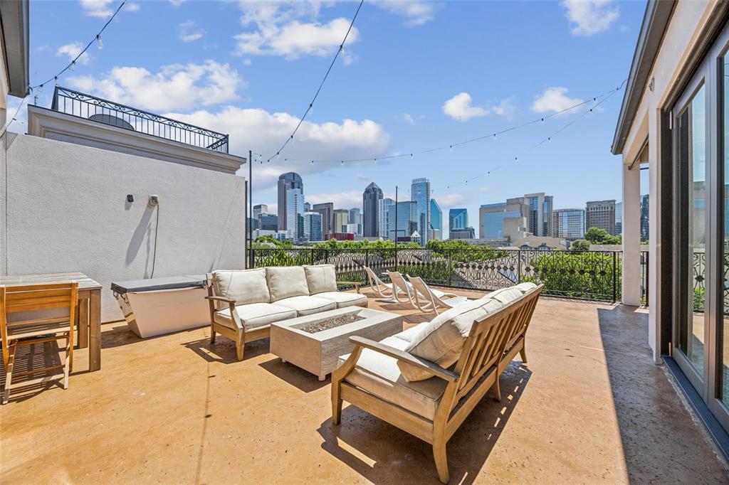 2210 Boll Street Dallas, TX 75204 - Photo 28 of 30 a terrace with outdoor seating and city view