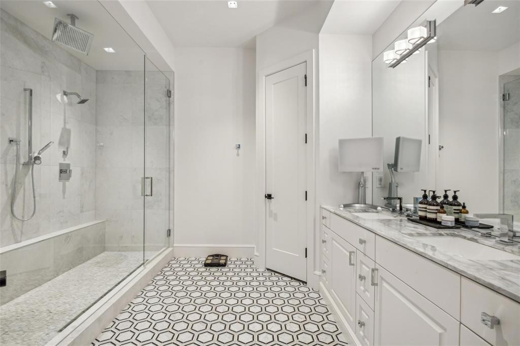 2210 Boll Street Dallas, TX 75204 - Photo 6 of 30 a bath room with a sink and a mirror