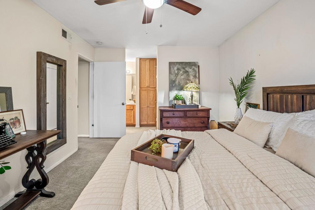 5922 Rancho Mission Road, Unit 78 San Diego, CA 92108 - Photo 19 of 25 a living room with furniture and a window