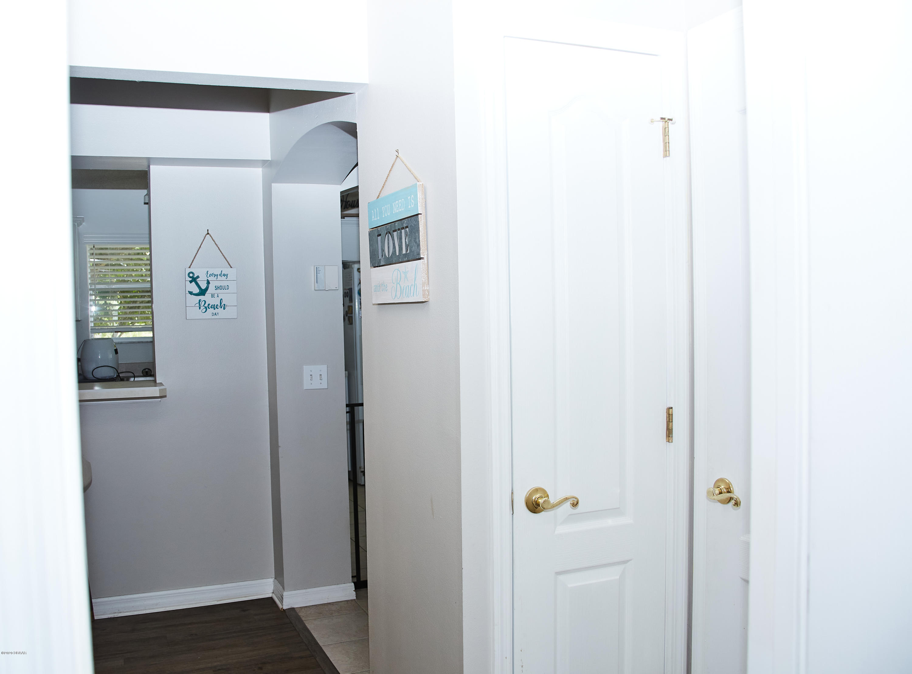 1 Reflections Village Drive Ormond Beach, FL 32174 - Photo 20 of 32 Hallway leading to Living room
