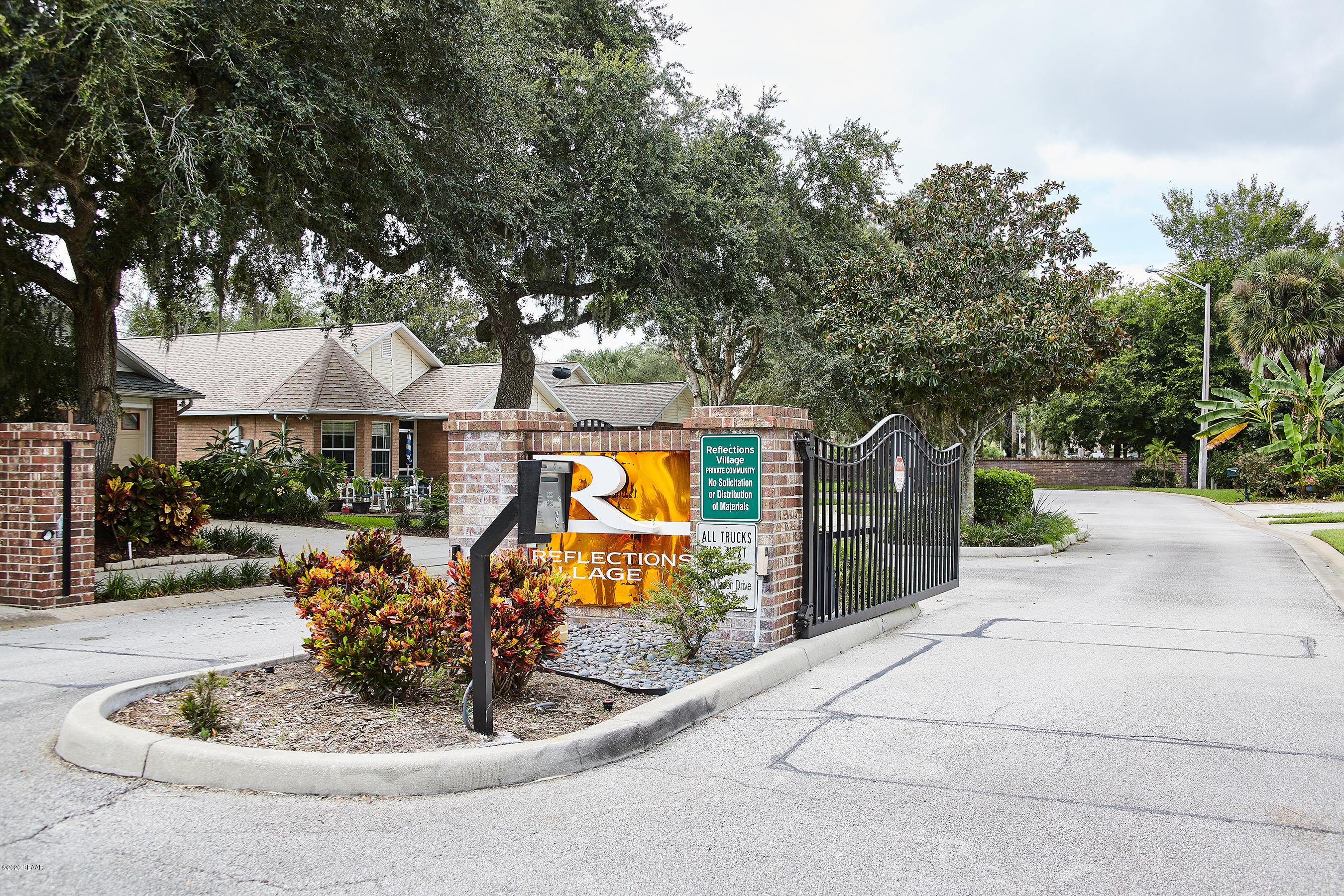 1 Reflections Village Drive Ormond Beach, FL 32174 - Photo 2 of 32 Gate Entrance