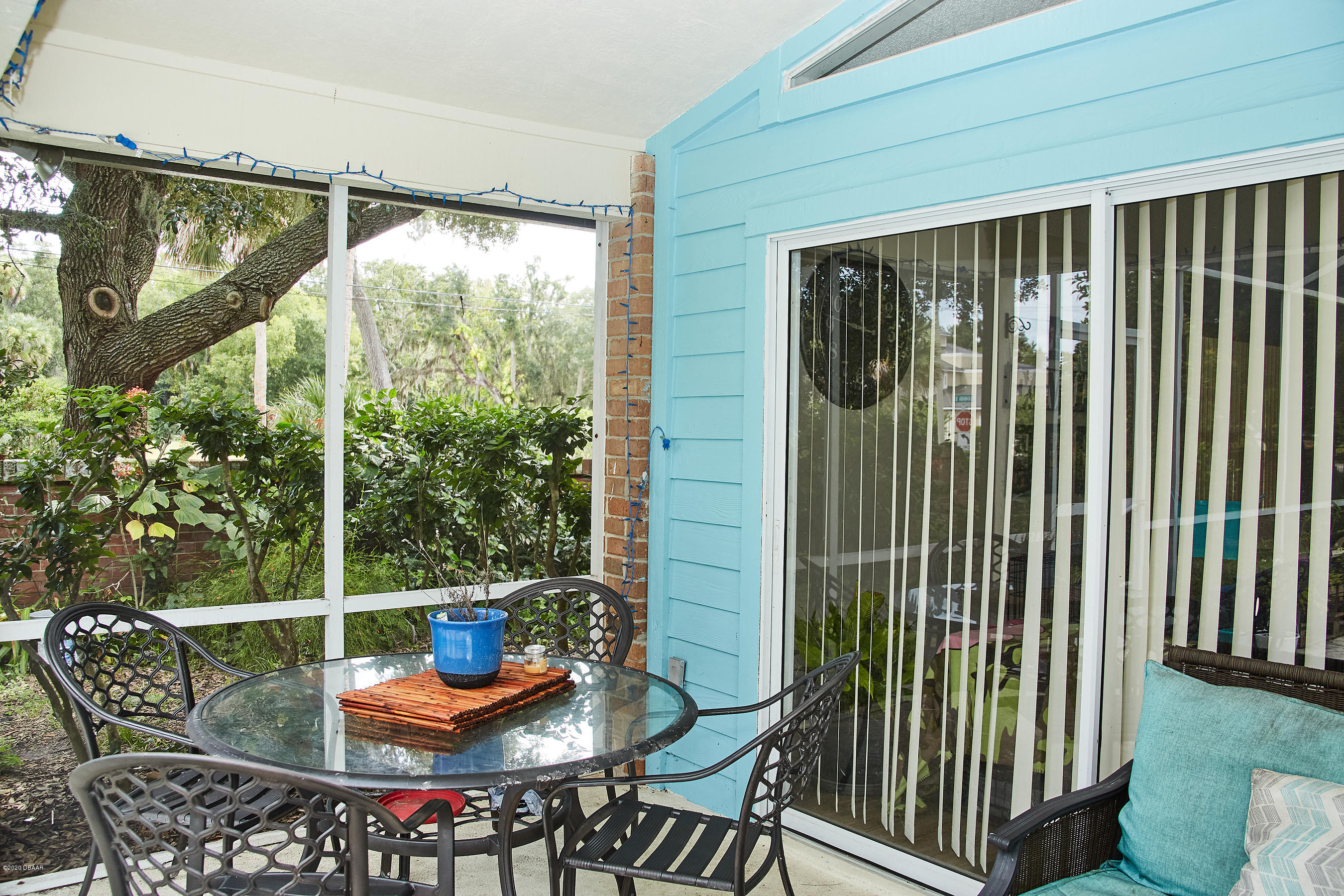 1 Reflections Village Drive Ormond Beach, FL 32174 - Photo 25 of 32 Back Porch Sitting Pool area
