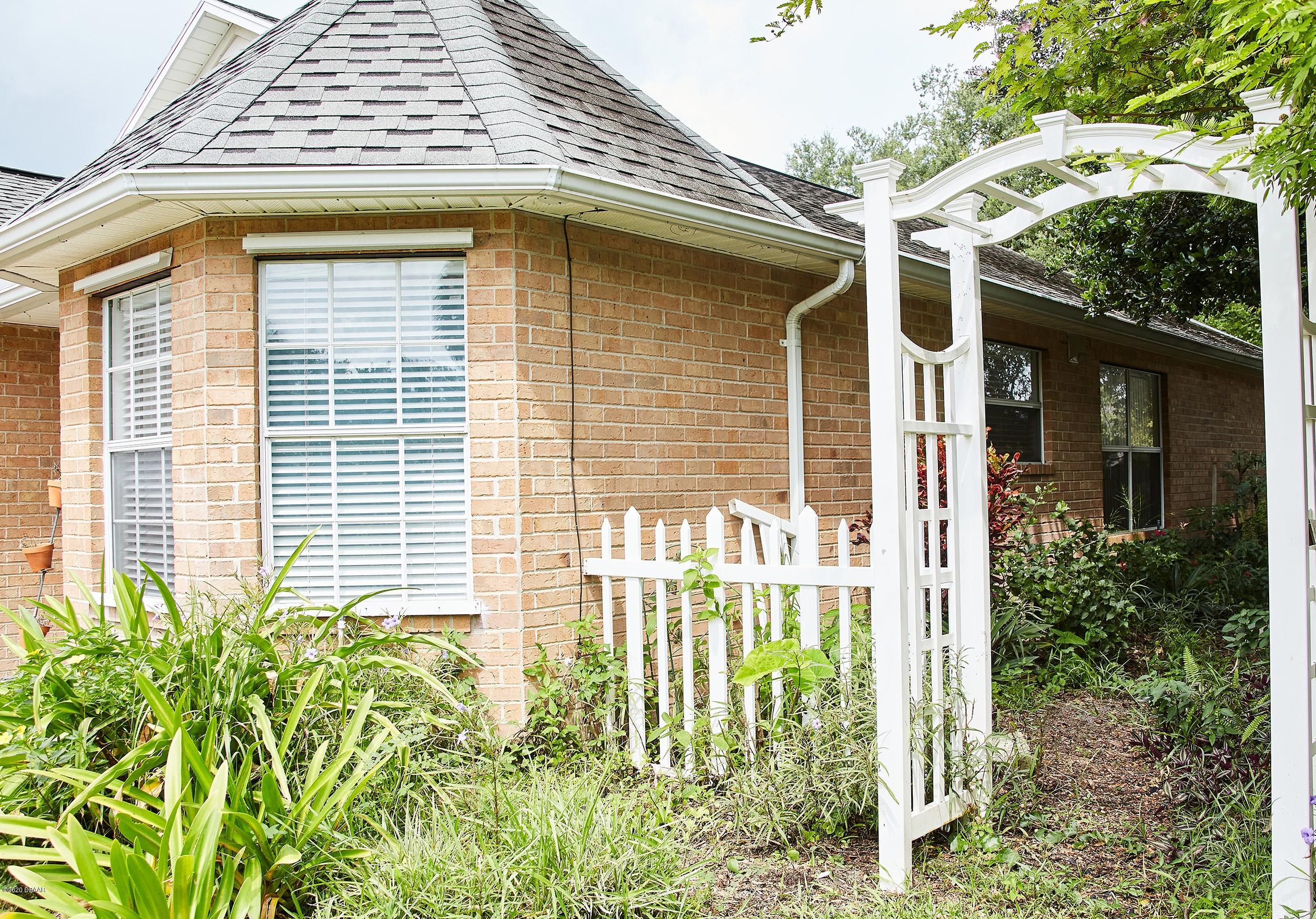 1 Reflections Village Drive Ormond Beach, FL 32174 - Photo 7 of 32 Right side of house modified