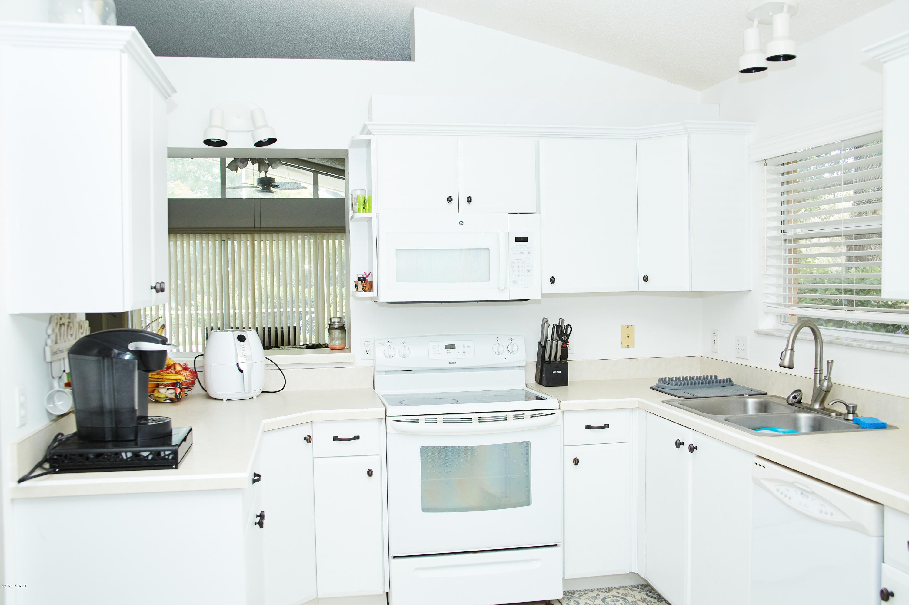 1 Reflections Village Drive Ormond Beach, FL 32174 - Photo 9 of 32 Eat in Kitchen other side pic 2