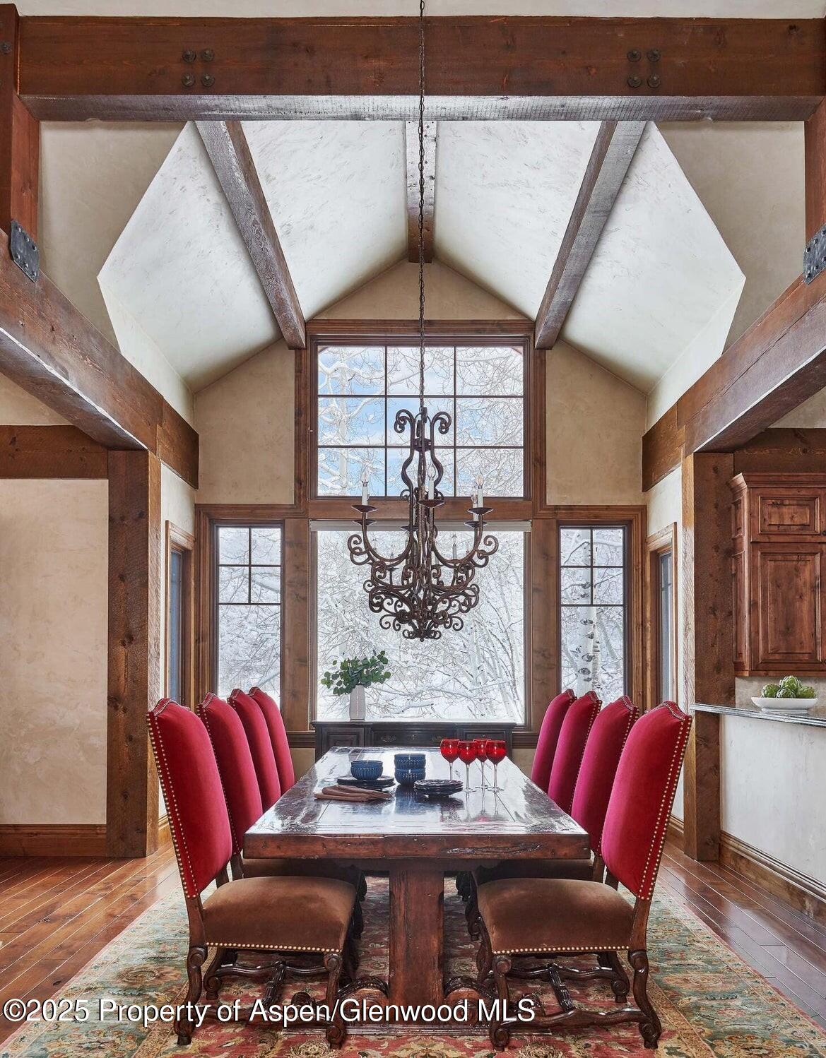 64 Spruce Ridge Lane Snowmass Village, CO 81615 - Photo 11 of 38 a view of a livingroom with furniture window and wooden floor