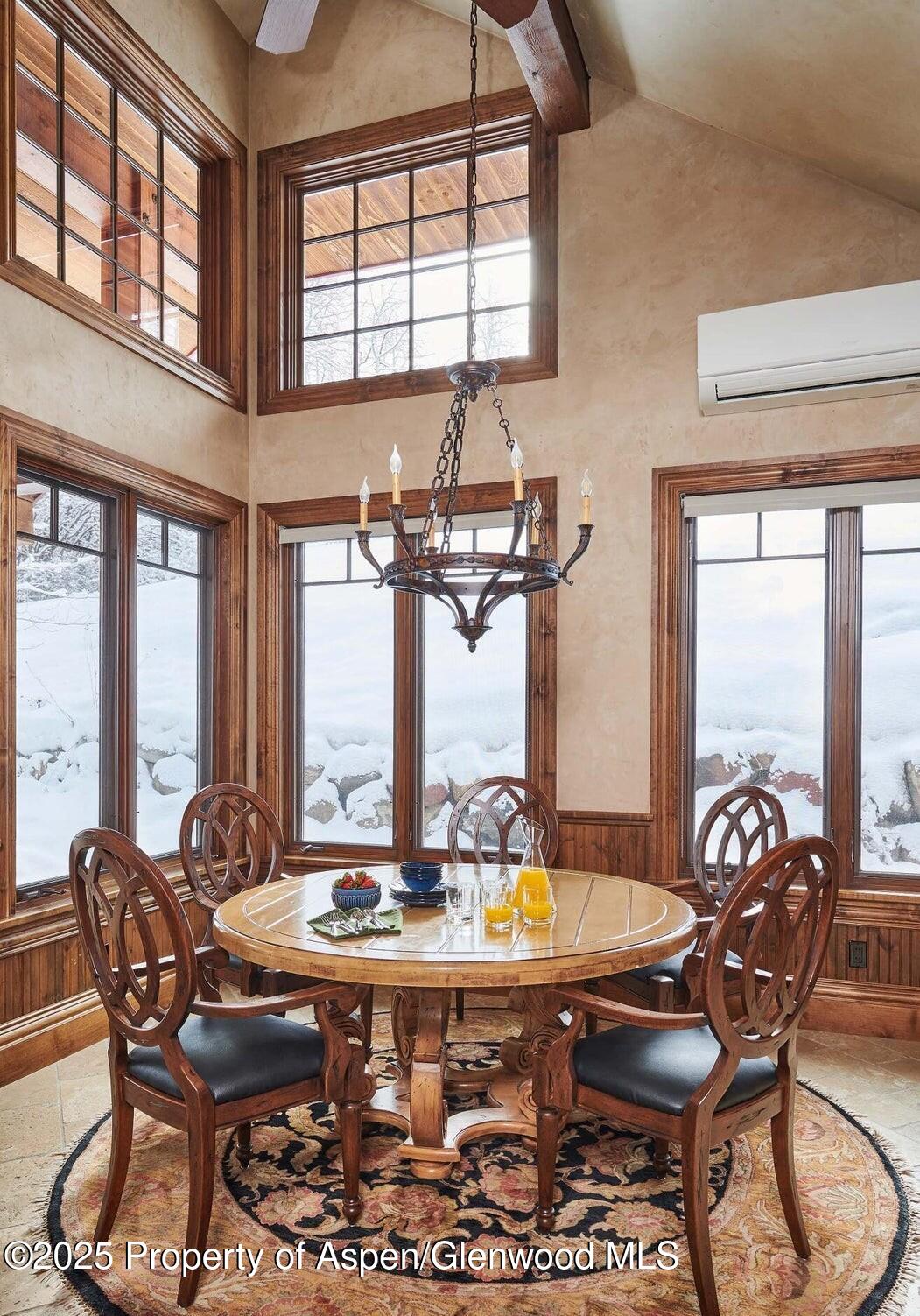 64 Spruce Ridge Lane Snowmass Village, CO 81615 - Photo 17 of 38 a view of a dining room with furniture window and outside view