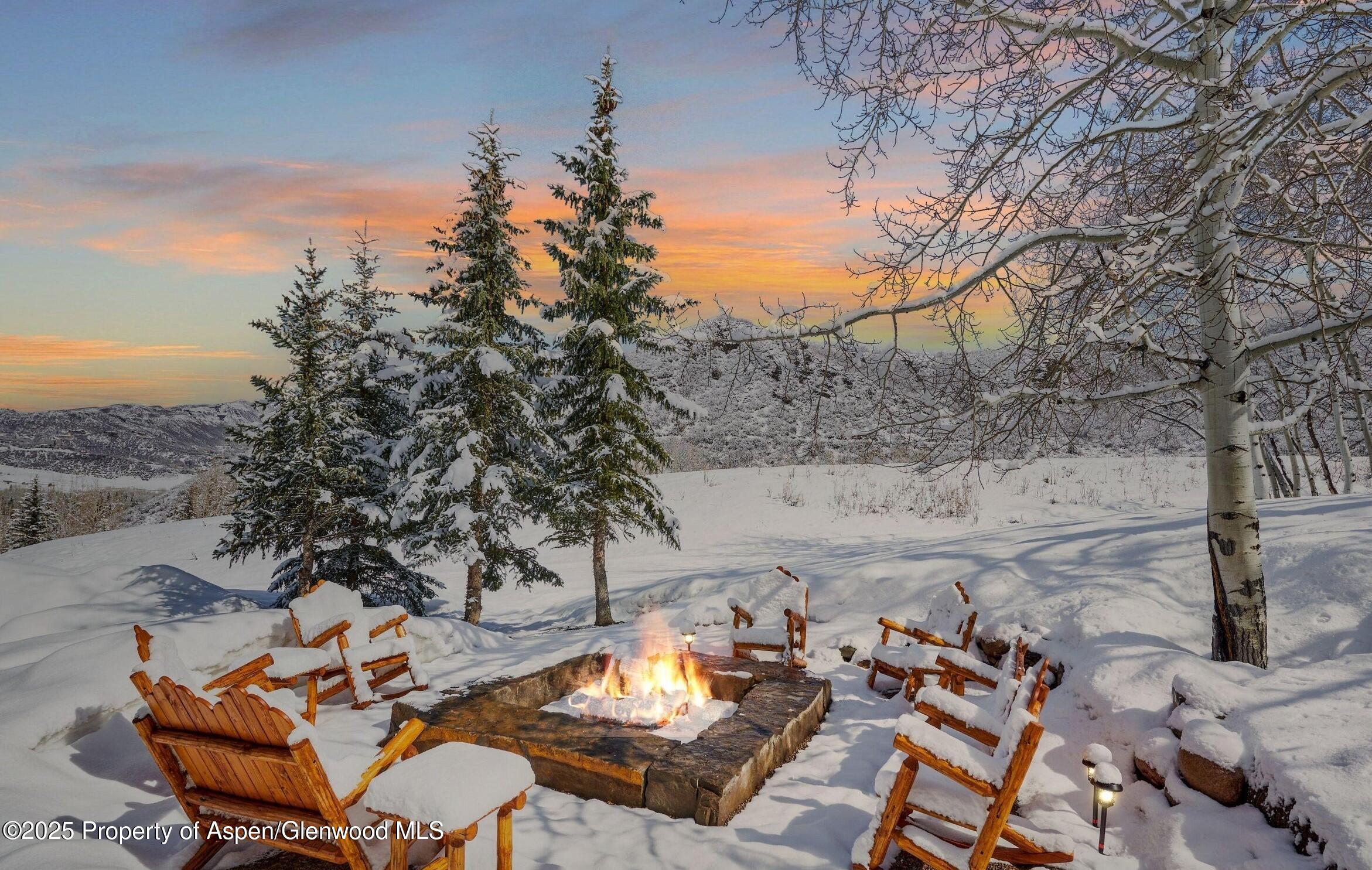 64 Spruce Ridge Lane Snowmass Village, CO 81615 - Photo 9 of 38 a view of a patio with chair and table