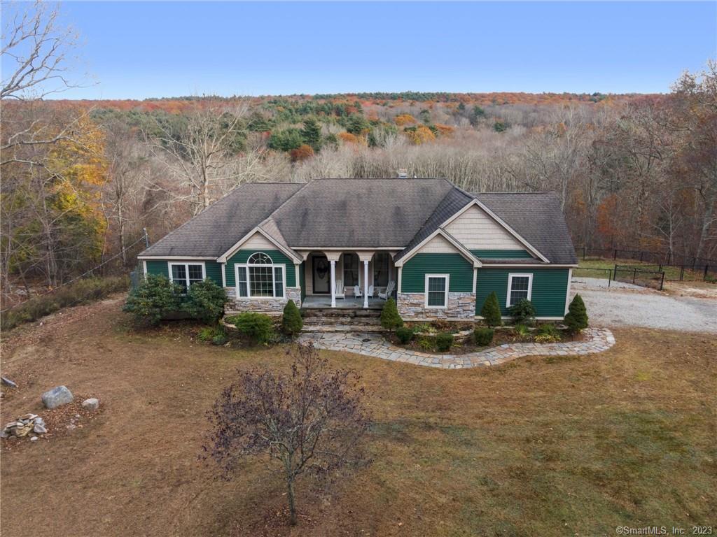 250 Snake Meadow Road Plainfield, CT 06354 - Photo 1 of 1 a front view of a house with a yard