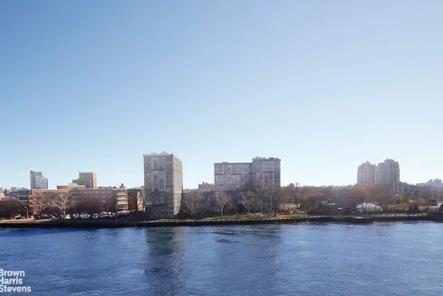 a view of a city with tall buildings in the background