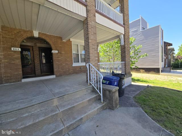 5314 Angora Terrace, Unit 1 Philadelphia, PA 19143 - Photo 2 of 15 a view of a house with backyard porch and sitting area