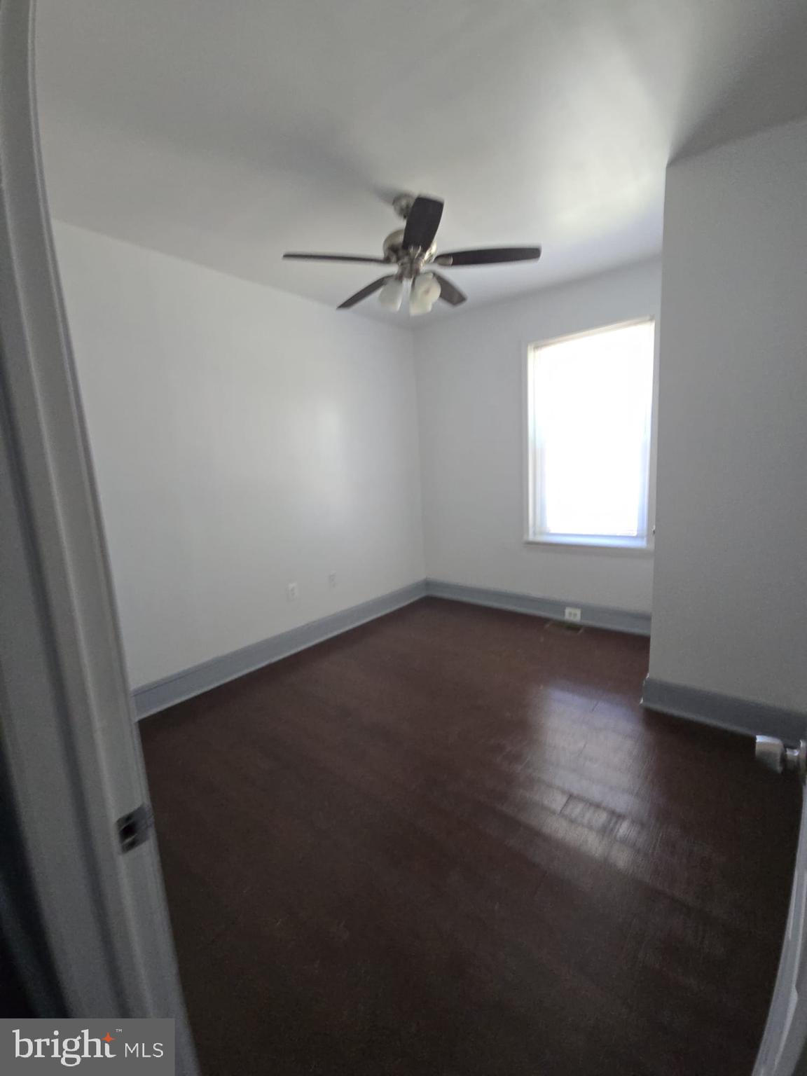5314 Angora Terrace, Unit 1 Philadelphia, PA 19143 - Photo 5 of 15 an empty room with a window