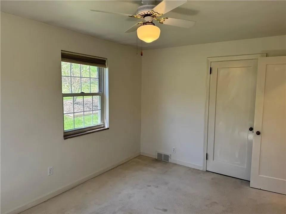 2251 Montgomery Road Sewickley, PA 15143 - Photo 21 of 36 an empty room with windows and closet