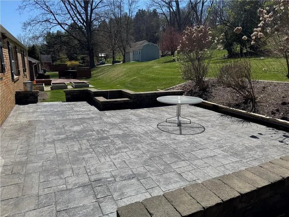 2251 Montgomery Road Sewickley, PA 15143 - Photo 35 of 36 a view of a swimming pool with a patio and garden