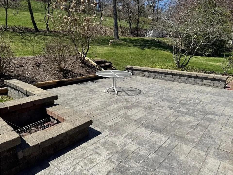 2251 Montgomery Road Sewickley, PA 15143 - Photo 36 of 36 a view of a backyard with table and chairs