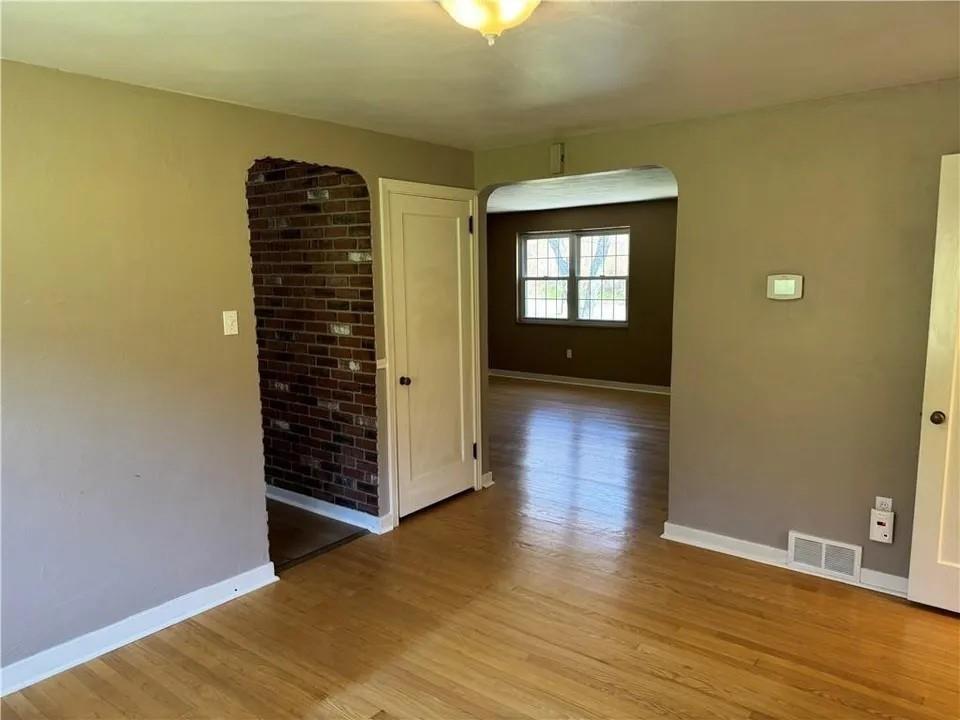 2251 Montgomery Road Sewickley, PA 15143 - Photo 6 of 36 wooden floor in an empty room with a window