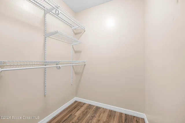 a view of small space with racks on the wall