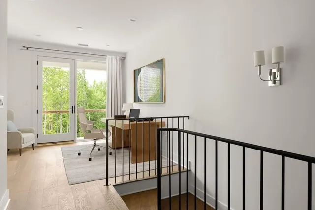 a view of a livingroom with furniture and window