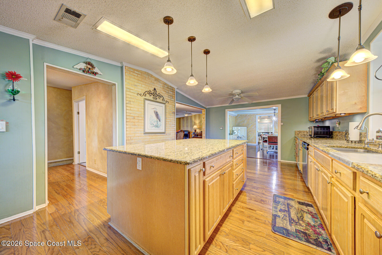 176 Woodsmill Boulevard, Unit 177 Cocoa, FL 32926 - Photo 11 of 63 9 kitchen island