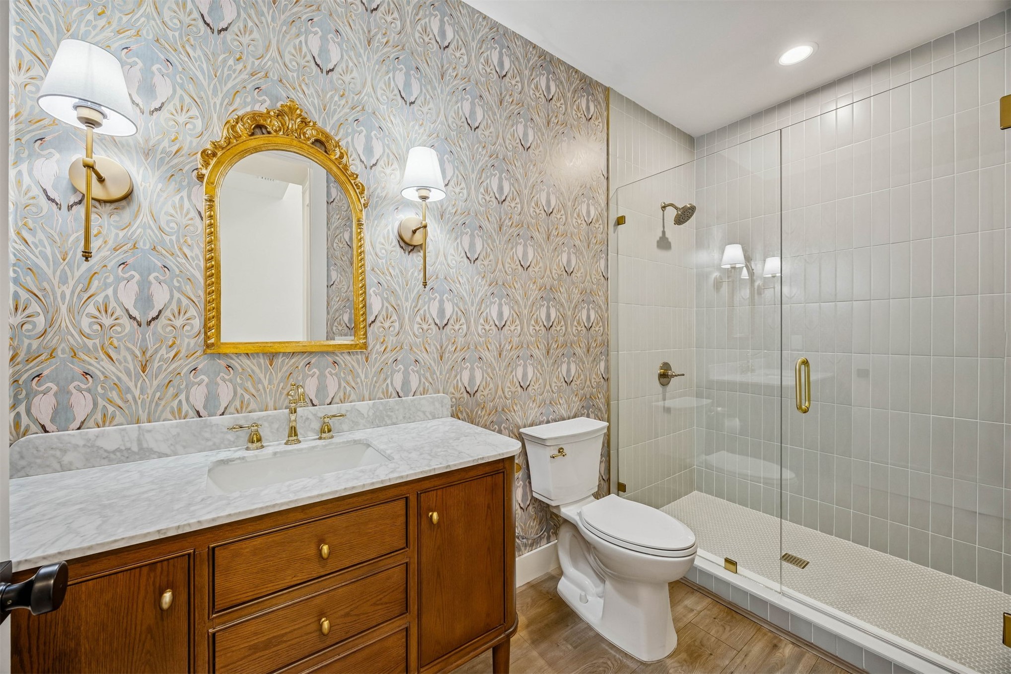 424 South 3rd Street Fernandina Beach, FL 32034 - Photo 13 of 38 a bathroom with a sink a toilet and shower
