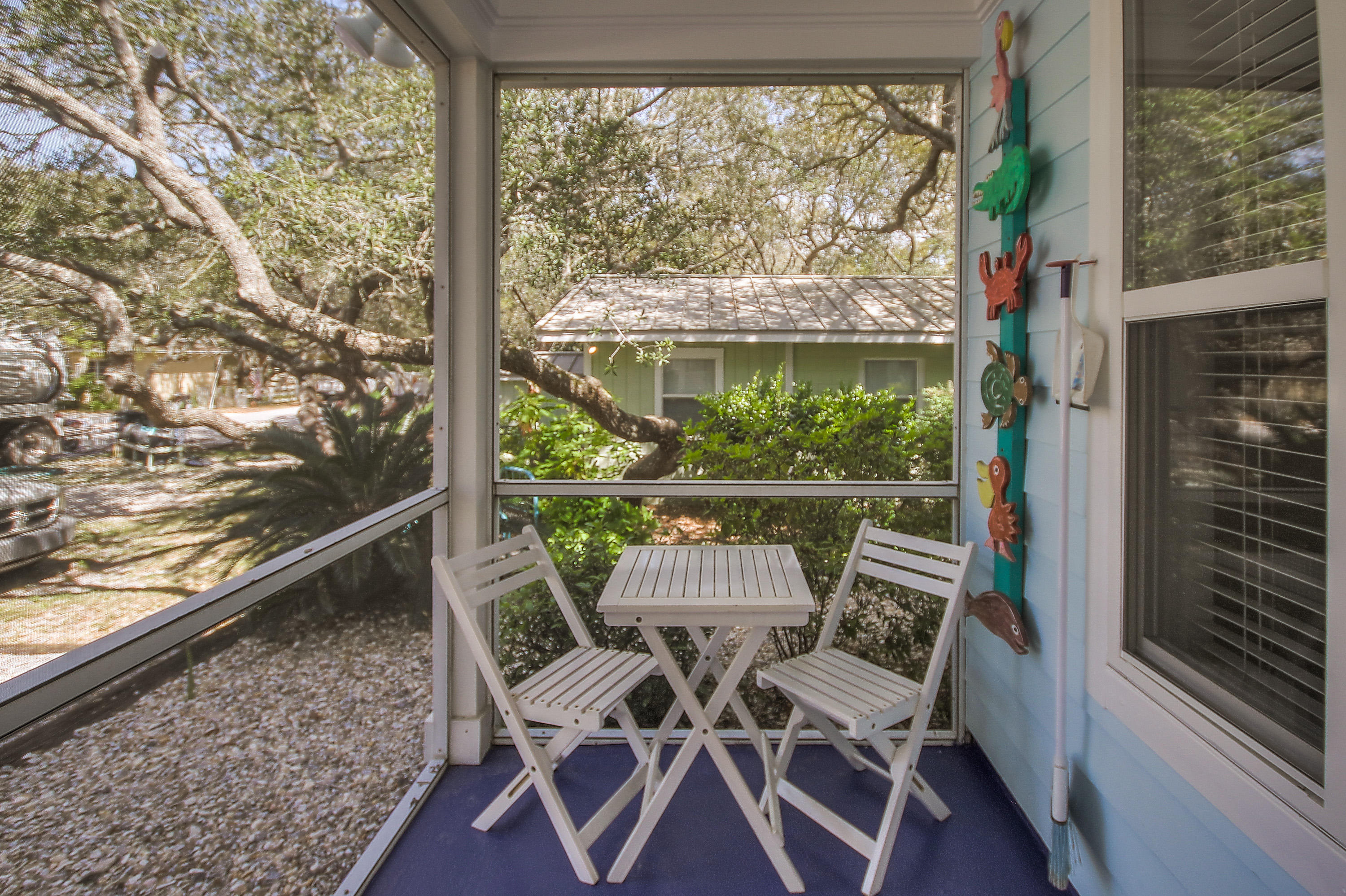 105 Garfield Street Santa Rosa Beach, FL 32459 - Photo 29 of 30 a view of a chair and table in the balcony