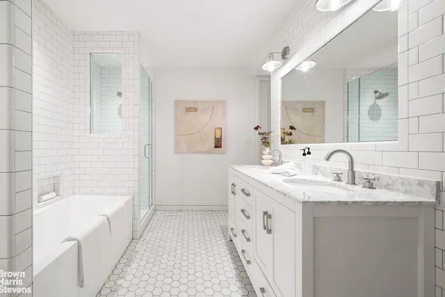 a bathroom with a sink a toilet and tub