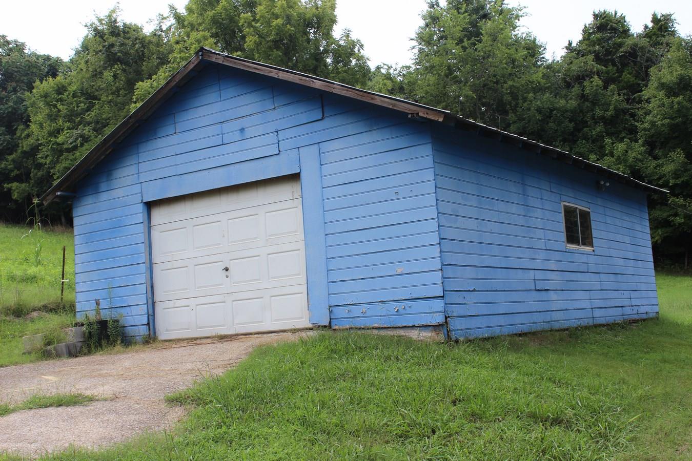 2594 Graham Road Culleoka, TN 38451 - Photo 2 of 24 Concrete floored shop is already connected to electricity.