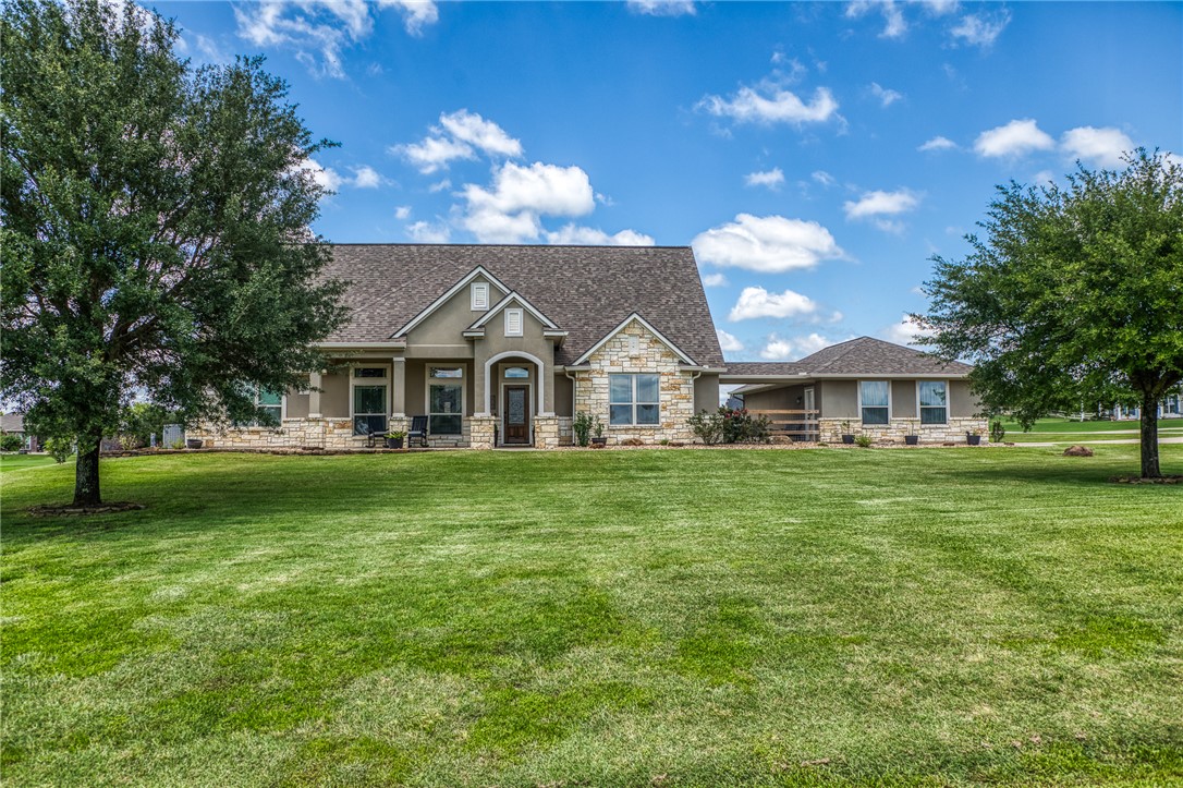 586 Ruby Drive Bellville, TX 77418 - Photo 1 of 50 a view of a white house with a yard